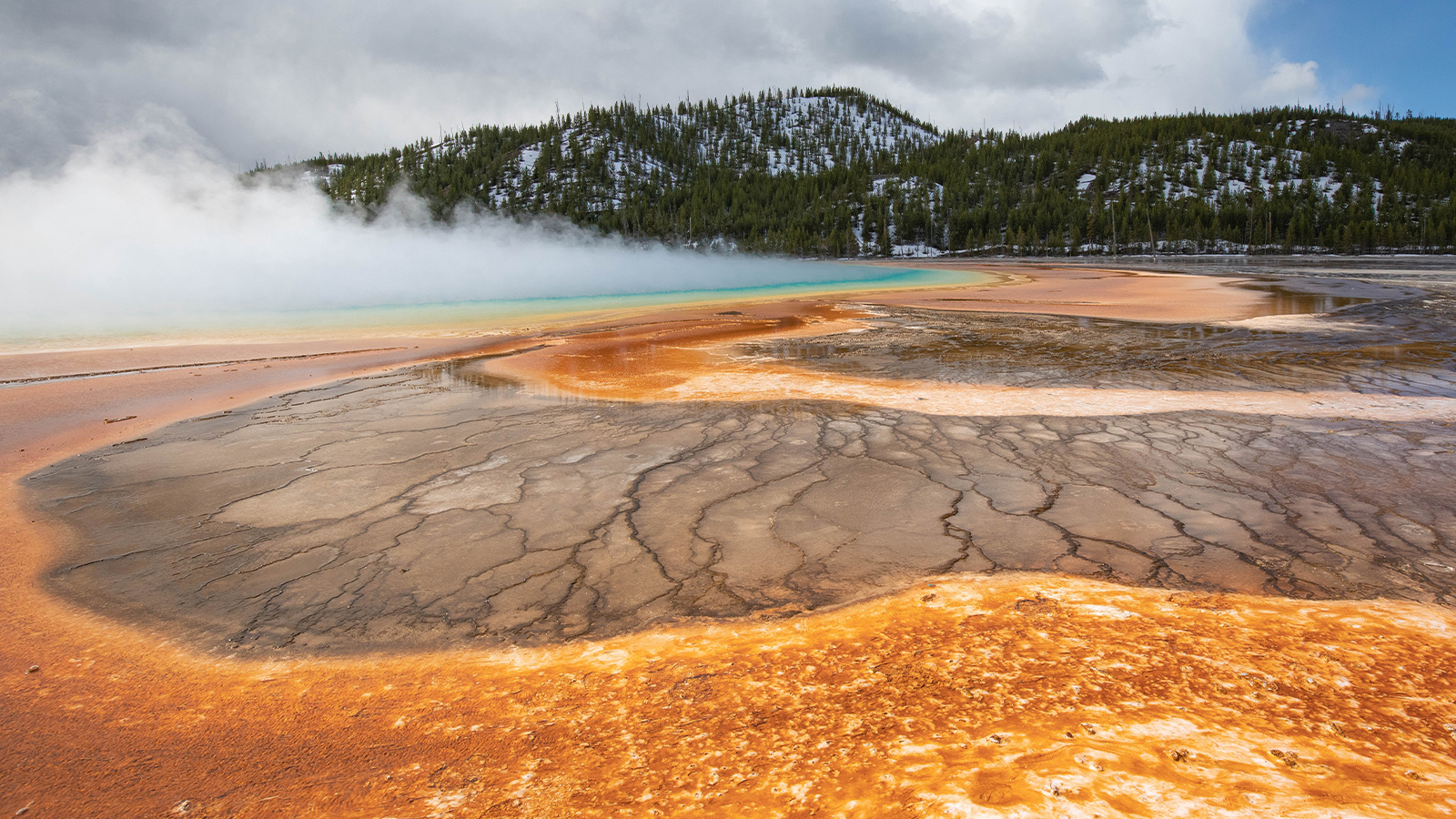 Colorful mineral terraces and geothermal landscape